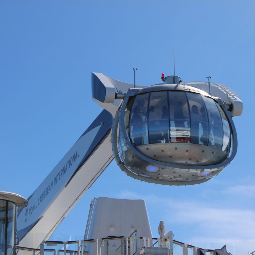 A large observation dome on an elevated platform with a clear sky in the background.